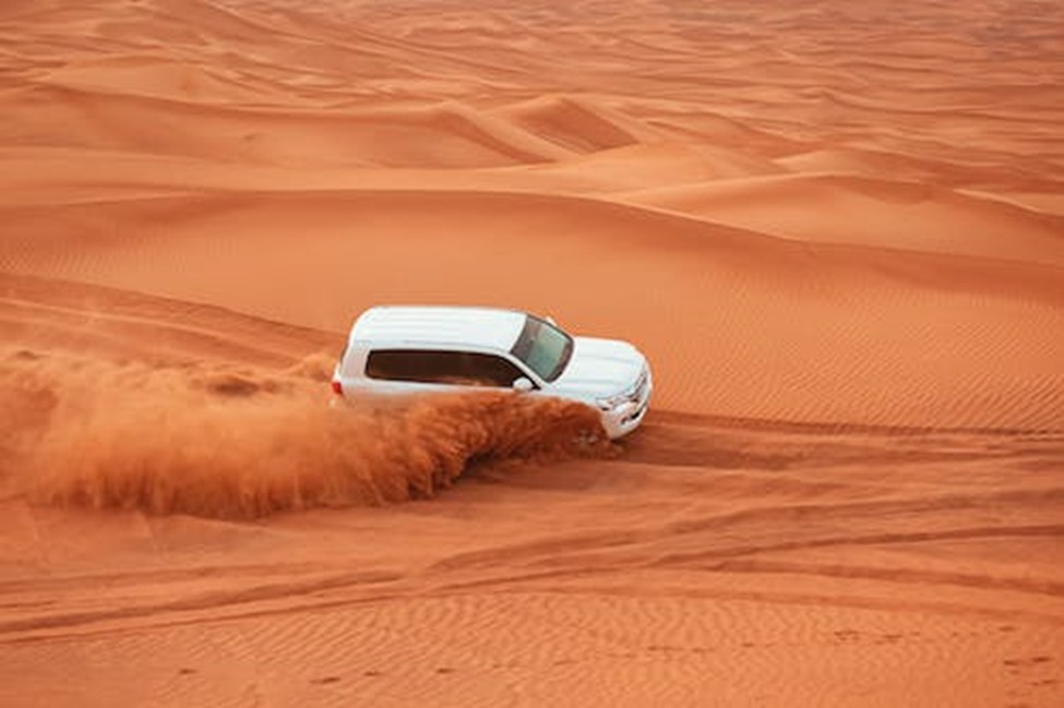 Unveiling the Enchantment: Witness the Majestic Desert Sunset on Your Dubai Safari Adventure