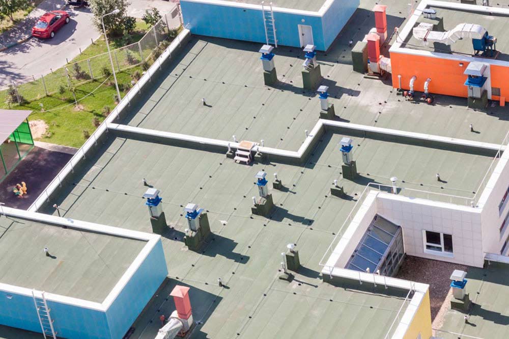 Why Do Commercial Buildings Have Flat Roofs? Unpacking the Functional Design Choice